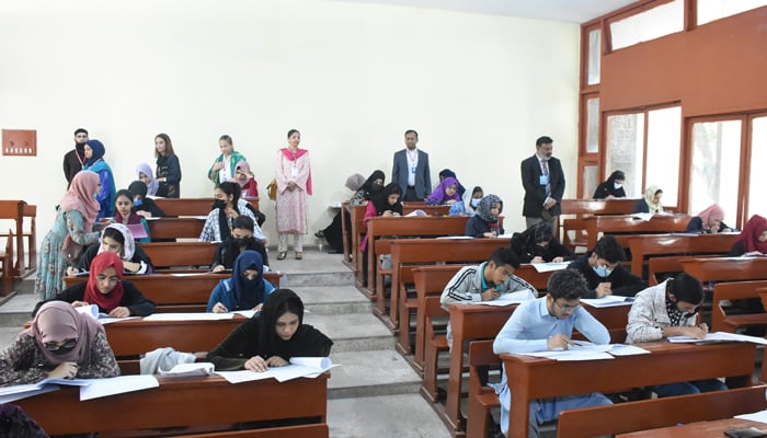 KU Vice Chancellor Prof Dr Khalid Mahmood Iraqi (R) can be seen monitoring during the entry test held for KUs degree programmes on December 3, 2023. — Facebook/Karachi University