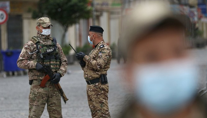 Iraqi security personnel can be seen standing in this image. — AFP/File