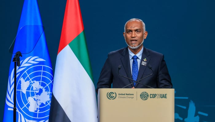Maldives President Mohamed Muizzu speaks during the High-Level Segment for Heads of State and Government session at the United Nations climate summit in Dubai on December 1, 2023. — AFP