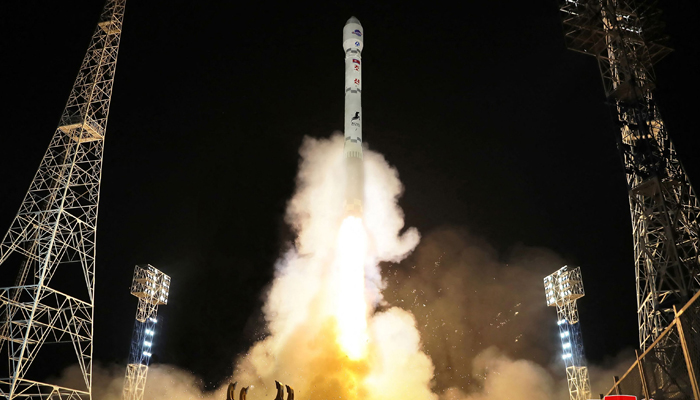 This picture taken on November 21, 2023, and released on November 22, 2023, shows a rocket carrying the reconnaissance satellite Malligyong-1 being launched from the Sohae Satellite Launch Site in North Phyongan province. — AFP