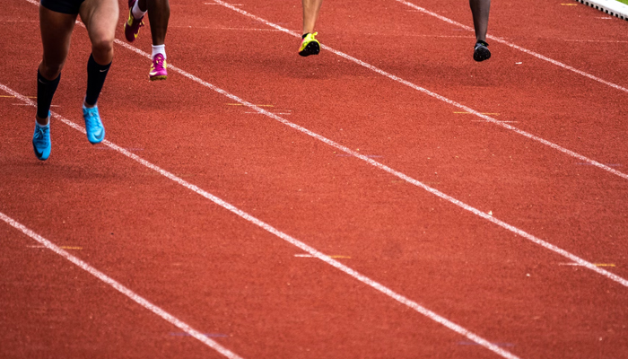 This representational image shows athletes running on a track. — Unsplash/File