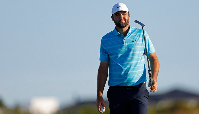 Scottie Scheffler of the US lines up a putt on the 18th hole during the final round of the Hero World Challenge at Albany Golf Course on December 03, 2023 in Nassau. — AFP