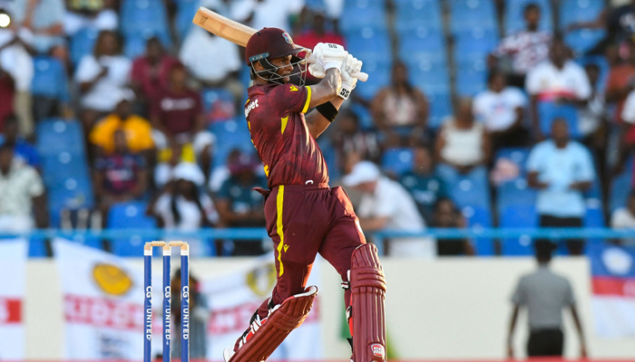 Shai Hope, of West Indies, hits 6 to win the first ODI cricket match between England and West Indies at Sir Vivian Richards Stadium in North Sound, Antigua and Barbuda, on December 3, 2023. — AFP
