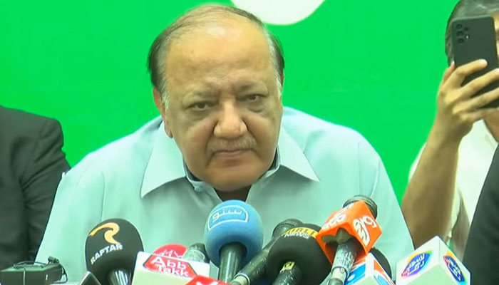 Chaudhry Wajahat Hussain addressing a press conference in Lahore, on May 22, 2023, in this still taken from a video. — YouTube/GeoNews