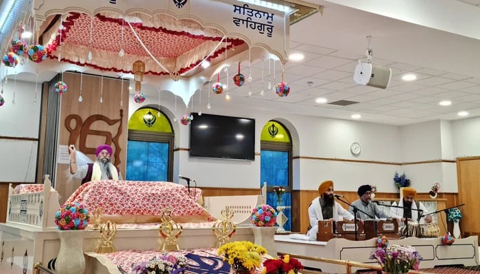 This photograph released on April 29 shows the Glasgow Gurdwara in the UK with believers in the midst of religious activity. — Facebook/Glasgow Gurdwara