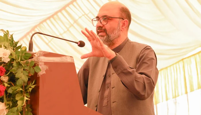 Minister for Newly Merged Districts Affairs Dr Aamer Abdullah speaks during an event on October 20, 2023. — Facebook/Khyber Pakhtunkhwa Economic Zones Development and Management Company