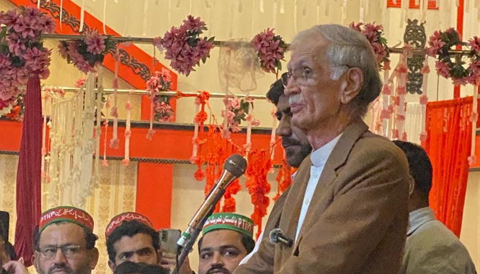 Pakistan Tehreek-e-Insaf-Parliamentarians Chairman and former federal defence minister Pervez Khattak speaks during the workers conventions on December 5, 2023. — Facebook/PTI-P