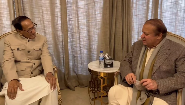 Pakistan Muslim League Nawaz supremo Nawaz Sharif (R) meets with the Pakistan Muslim League Quaid chief Chaudhry Shujaat Hussain in this still on December 6, 2023. — Facebook/PML(N)