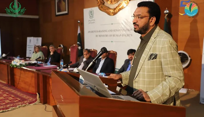 Caretaker Human Rights Minister Khalil George speaks during a public event in this image on November 2, 2023. — Facebook/Allama Iqbal Open University