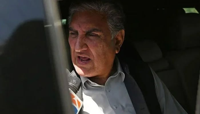Shah Mahmood Qureshi, deputy head of PTI, speaks with the media in Islamabad on May 10, 2023. — AFP
