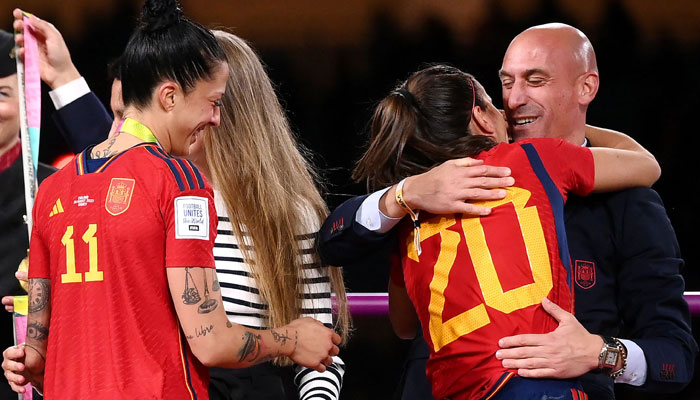 Disgraced former Spanish football federation president Luis Rubiales (R) next to Jennifer Hermoso after winning the Australia and New Zealand 2023 Womens World Cup final football match between Spain and England at Stadium Australia in Sydney on August 20, 2023.— AFP