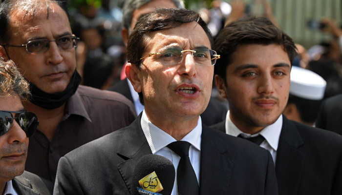 Gohar Khan (C), leading lawyer of the legal team of imprisoned former PM Imran Khan, speaks with the media outside the IHC on August 29, 2023. — AFP