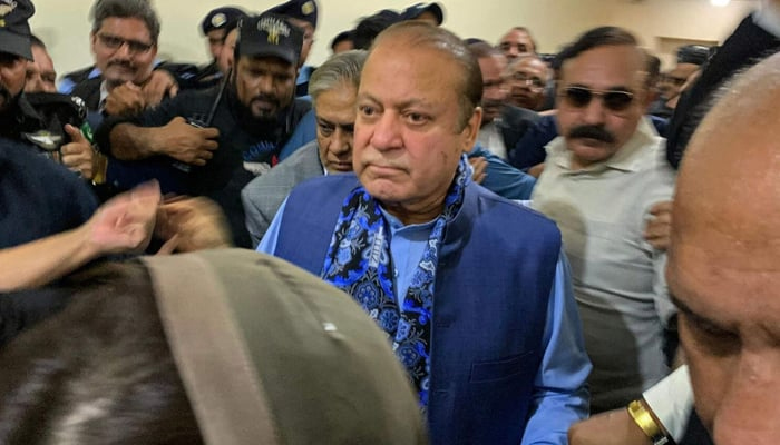 Former Pakistan’s PM and graft convict Nawaz Sharif (C) arrives to appear before the court in Islamabad on October 24, 2023. — AFP