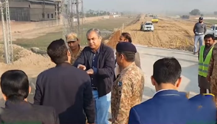 Caretaker Chief Minister Mohsin Naqvi gestures as he visits the Gujranwala Motorway Link Road Project on December 8, 2023, in this still. — Facebook/Govt of Punjab