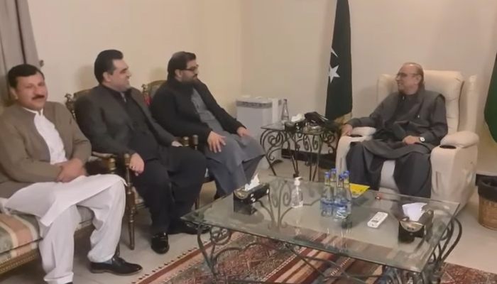This still shows Pakistan People’s Party Co-Chairman Asif Ali Zardari (R) and Chairman Bilawal Bhutto Zardari (not pictured) while meeting with the Awami National Party leader Aimal Wali Khan (c) in Islamabad on December 8, 2023. — Facebook/Aimal Wali Khan
