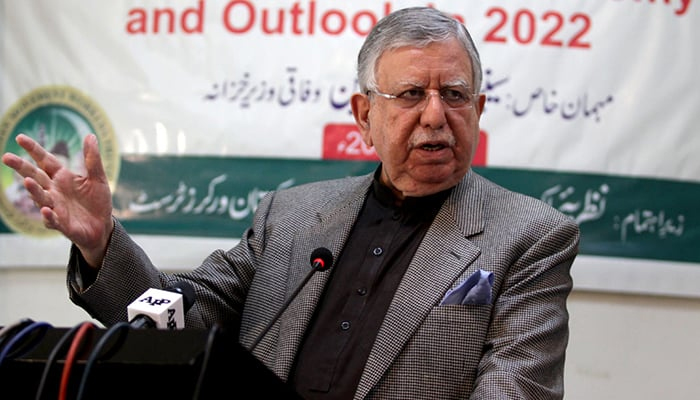 Former finance minister Shaukat Tarin gestures while addressing the audience of an event. — AFP