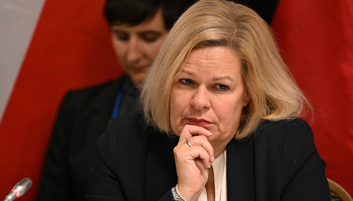 German minister Nancy Faeser attends the press conference table in the conference hall of Hotel Forras in Szeged, close to the Hungarian and Serbian border on November 27, 2023. — AFP