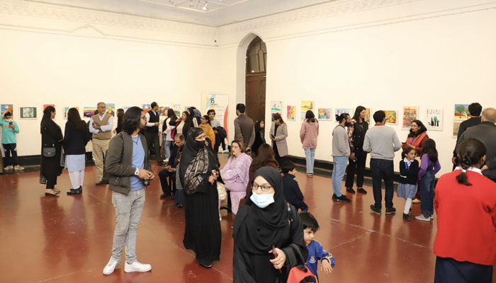 People can be seen interacting during the 15th ArtBeat Exhibition on December 9, 2023. — Facebook/National College of Arts (NCA)