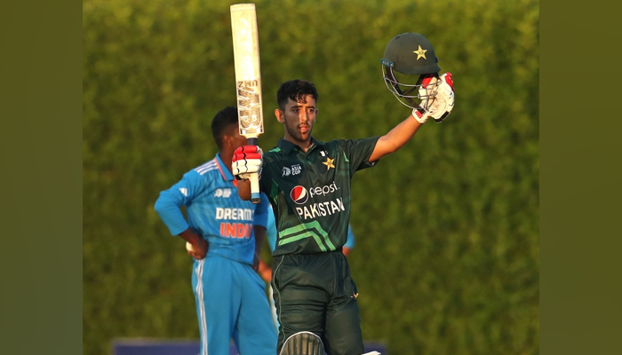 Pakistans Azan Owais celebrates after an unbeaten century at the ICC Academy Ground in the ACC Under-19 Asia Cup against India on December 10, 2023. — X/@TheRealPCB