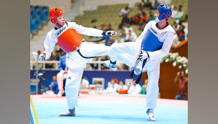 This image shows two competitors during the game. — Pakistan Taekwondo website