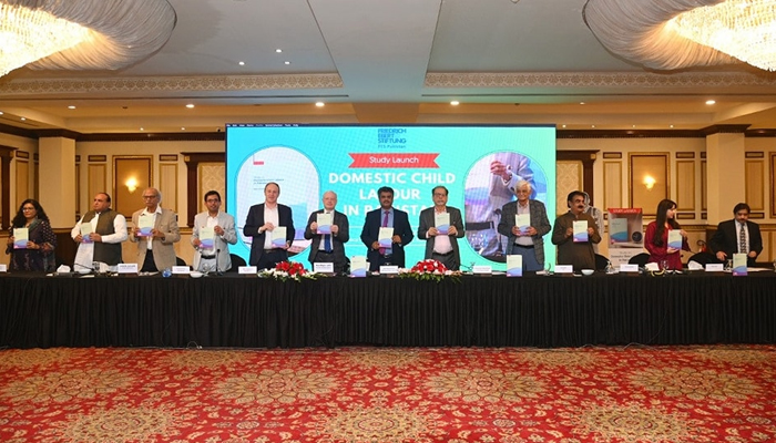 This image shows speakers posing for a group picture during a study launch on ‘Domestic Child Labour in Pakistan’ authored by SHRC Chairperson Iqbal Detho on December 10, 2023. — Facebook/Sindh Human Rights Commission