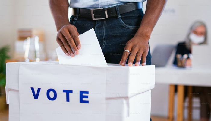 This representational image shows a person casting a vote. — Unsplash/File