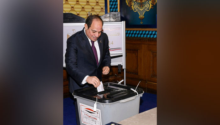 Egyptian President Abdel Fattah al-Sisi cast his vote in the presidential election at Mustafa Yousry Emmera School in Cairo on December 10, 2023. — AFP