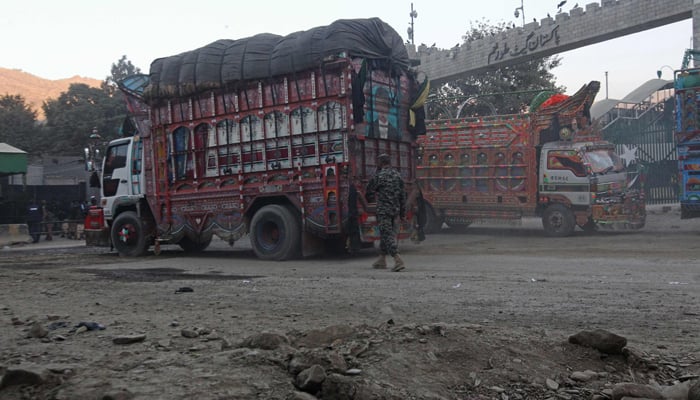 Trucks are pictured at the zero point Torkham border crossing between Afghanistan and Pakistan, in Nangarhar province on December 6, 2023. — AFP