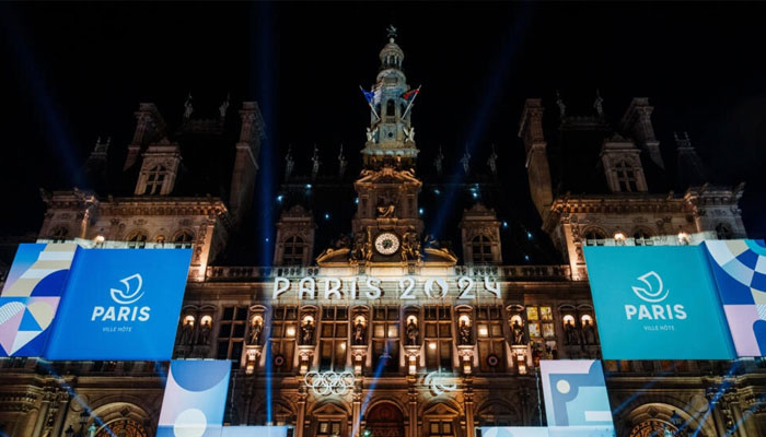 Olympic logos on Paris City Hall, eight months before the Games begin on July 26, 2024. — AFP File