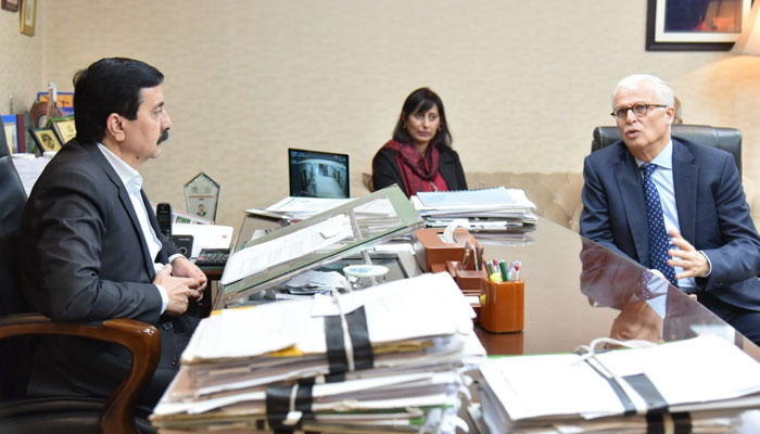 In this image released on Dec 11, 2023, Pakistan Bait-ul-Mal (PBM) Managing Director Amir Fida can be seen with Adriano Trio, the Head of Roche Pharma (Global) at his office.  — APP File