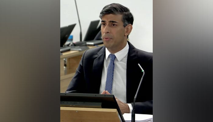 A video grab from footage broadcast by the UK Covid-19 Inquiry shows Britains Prime Minister Rishi Sunak giving evidence at the UK Covid-19 Inquiry, in west London, on December 11, 2023. — AFP