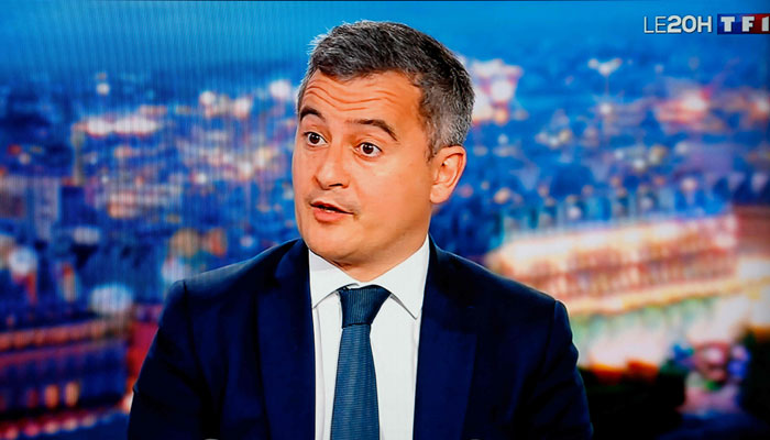 French Interior Minister Gerald Darmanin speaks during an interview in the evening news broadcast of French TV channel TF1, in the TF1 studios in Boulogne-Billancourt, outside Paris, on December 11, 2023. — AFP