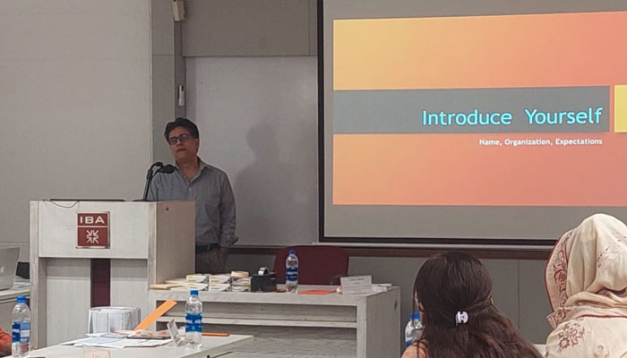 This image shows Trainer Kamal Siddiqi addressing a workshop aimed at promoting gender-sensitive reporting to raise awareness of violence against women on December 12, 2023. — Facebook/CEJ