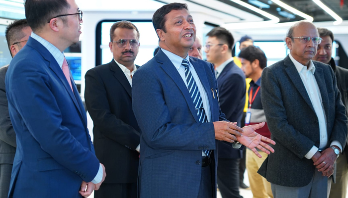 Prof. Dr. Iqbal Choudhry (c), Coordinator General of COMSTECH gestures as he meets tech officials on December 13, 2023. — Facebook/COMSTECH
