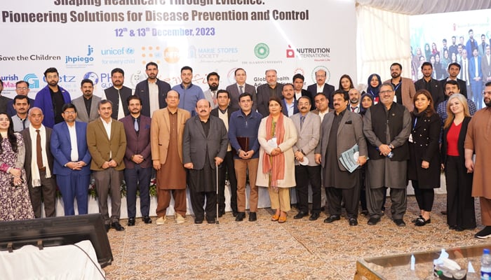 Health experts pose for a group photo on the occasion of the 13th International Public Health Conference 2023 on December 13, 2023. — Facebook/Health Services Academy