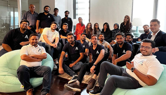 In this photo, posted on October 6, 2022, team members of Pakistan-based fintech, Abhi, gather for a group photo at their office in Lahore. — Facebook/ Abhi