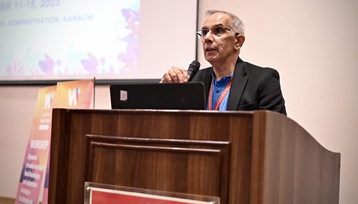 This image released on December 13, 2023, shows Dr Akbar Zaidi, executive director of the IBA Karachi speaking during the 2nd edition of the Social Sciences Winter School on ‘Environmental Change, Societies at Risk and Social Vulnerabilities in South Asia’. — Facebook/IBA - Institute of Business Administration