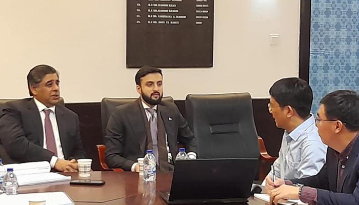 Federal Minister for Trade and Commerce Gohar Ejaz speaks as provincial Transport Minister Ibrahim Hassan Murad sits during a meeting with the Chinese on December 13, 2023. — Facebook/Ibrahim Hasan Murad