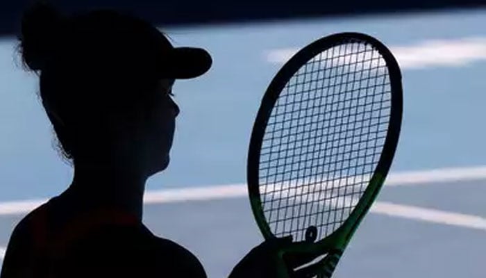 In this representational image, women hold a racket. — AFP/File