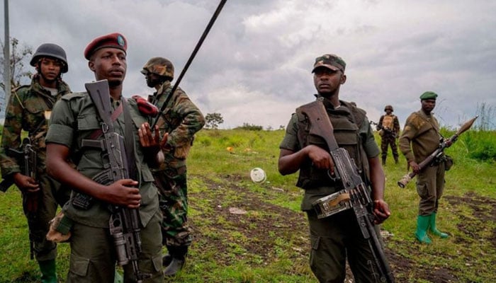 M23 rebels look on in Kibumba in eastern Democratic Republic of Congo, on December 23, 2022.  — AFP File
