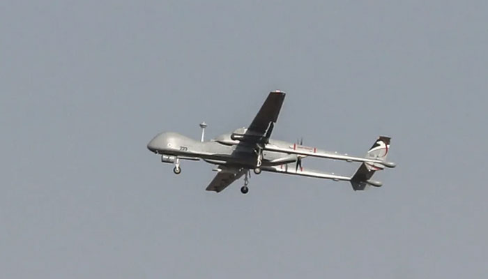 A military drone flies near the border with Gaza. — AFP/File