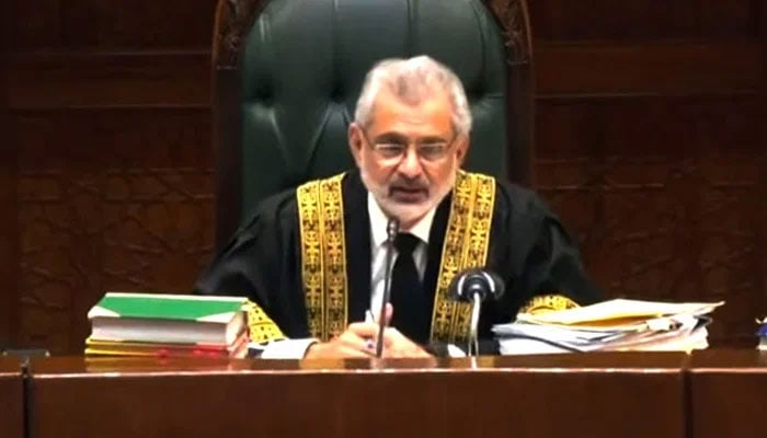 Chief Justice of Pakistan Qazi Faez Isa presides the televised full court hearing on September 18, 2023, in this still taken from a video. — YouTube/PTV News Live
