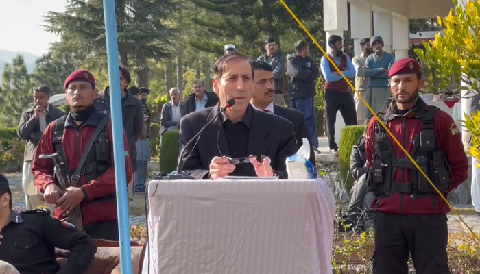 Caretaker CM Justice (r) Syed Arshad Hussain Shah speaks while meeting with the notables of the district of Abbottabad in this still on December 17, 2023. — Facebook/Government of Khyber Pakhtunkhwa