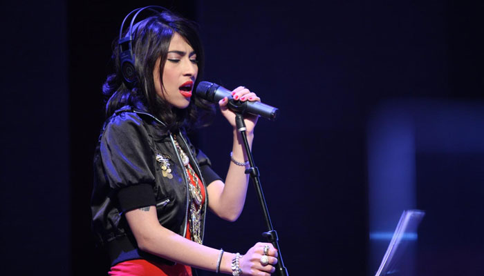 This image shows Pakistan’s celebrated rockstar Meesha Shafi singing. — Instagram/@coke_studio