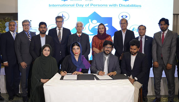 The image released on Dec 17, 2023, shows the singing ceremony between Faysal Bank Limited (FBL) and Boltay Huroof. — Facebook/sarwat.n.shah