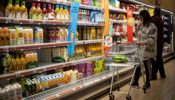 A representational image of a person during a shopping at a grocery store. — AFP/File