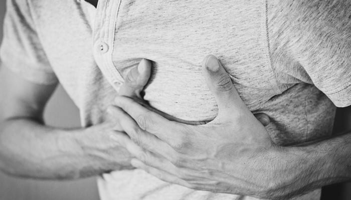 This image shows a person holding his chest due to pain. — Pixabay/File