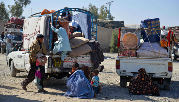 Afghan refugees arrive from Pakistan at the Afghanistan-Pakistan border in Spin Boldak district of Kandahar province on December 3, 2023. — AFP
