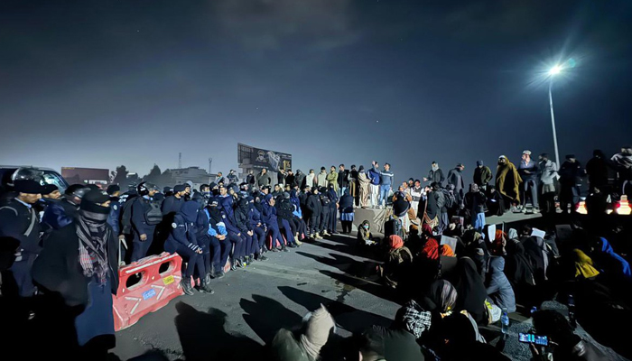 This image shows Islamabad police intercepting the Baloch marchers in Islamabad on December 20, 2023. — X/@AasimSajjadA