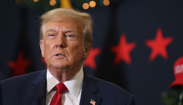 Republican presidential candidate and former US President Donald Trump looks on during a campaign event on December 19, 2023 in Waterloo, Iowa. — AFP